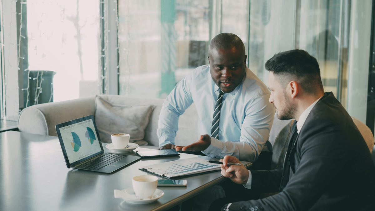 Business team reviewing charts and analytics for customer feedback planning